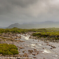 Buy canvas prints of A fast flowing Scottish Highland river on a stormy day in the Isle of Skye by SnapT Photography