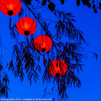 Buy canvas prints of Red vietnamese or chinese lanterns contrasting with a blue sky by SnapT Photography