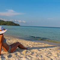 Buy canvas prints of A female asian model relaxing in the sun on Sao Be by SnapT Photography