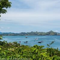 Buy canvas prints of A view over Labuan Bajo harbour and Palua Karawo in early morning, Indonesia by SnapT Photography