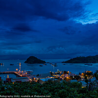 Buy canvas prints of Hill top view over Labuan Bajo harbour in the evening at twilight by SnapT Photography