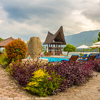 Buy canvas prints of A Bataknese villa on the shore of Lake Toba, North Sumatra, Indonesia by SnapT Photography