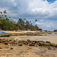 Buy canvas prints of A boat on Melina Beach on Tiomen Island, Malaysia by SnapT Photography