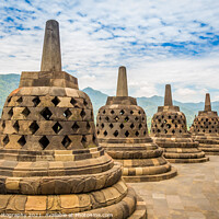 Buy canvas prints of Stupas that look like bells on top of the Borobudur Buddhist temple, Indonesia by SnapT Photography
