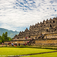 Buy canvas prints of A line of tourists ascending the stairs on the Borobudur Buddhist temple, Indonesia by SnapT Photography