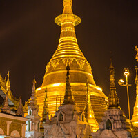 Buy canvas prints of The Shwedagon Pagoda in Yangon illuminated at night by SnapT Photography