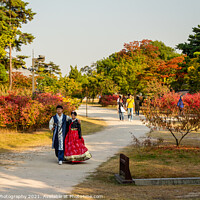 Buy canvas prints of A couple in traditional Korean hanbok dress at Gyeongbokgung Palace, Seoul by SnapT Photography