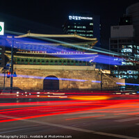 Buy canvas prints of Long exposure of the traffic on the road at Sungnyemun Gate at night in Seoul by SnapT Photography