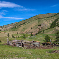 Buy canvas prints of A cattle pen in the Mongolian mountains, surrounded by grassland by SnapT Photography