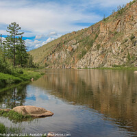 Buy canvas prints of A stunning mountain reflection on a river in Mongolian on a sunny day by SnapT Photography