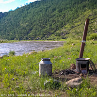 Buy canvas prints of A traditional Mongolian camp cooker and chimney, beside a river by SnapT Photography