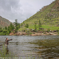 Buy canvas prints of Fly fisherman casting a fly on a river in Mongolia during the summer, Moron, Mongolia by SnapT Photography