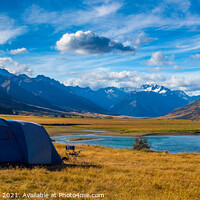 Buy canvas prints of A tent pitched beside a river, surrounded by mountains, in New Zealand by SnapT Photography
