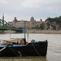 Buy canvas prints of A view across the Danube to Liberty Bridge and Gellert in Budapest by SnapT Photography