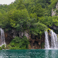 Buy canvas prints of Two waterfalls flowing into a lake at Plitvice Lakes, UNESCO World Heritage Site by SnapT Photography