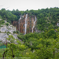 Buy canvas prints of A large waterfall at a lake at Plitvice Lakes, UNESCO World Heritage Site, by SnapT Photography