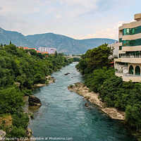 Buy canvas prints of The treelined fast flowing Neretva river in Morstar by SnapT Photography