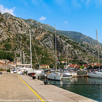 Buy canvas prints of Luxury yachts moored at the harbour in the Old Town of Kotor, Montenegro by SnapT Photography