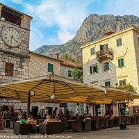 Buy canvas prints of A cafe at the Clock Tower at the Square of Arms, the Old Town of Kotor by SnapT Photography