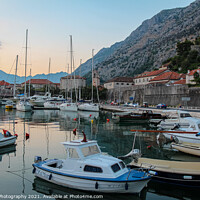 Buy canvas prints of Sunset at the harbour with boats, in the Old Town of Kotor, Montenegro by SnapT Photography