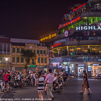 Buy canvas prints of People gathering at Dong Kinh Nghia Thuc Square at night, Hanoi by SnapT Photography