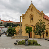 Buy canvas prints of St. Stephan Capuchin Church and Marian column in the old town in Bratislava by SnapT Photography