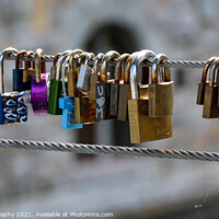Buy canvas prints of Close up of the padlocks on Butchers Bridge in old medieval Ljubljana, Slovenia by SnapT Photography