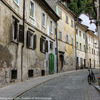 Buy canvas prints of An old, historic, medieval street in Ljubljana, near Ljubljana castle, Slovenia by SnapT Photography