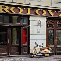 Buy canvas prints of Rotovz or City Hall in Mestni Trg, with a Vespa parked outside, east Ljubljana by SnapT Photography
