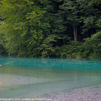 Buy canvas prints of A fisherman at the Soca and Tolminka River confluence at Tolmin, Slovenia by SnapT Photography