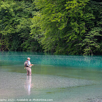 Buy canvas prints of A man fly fishing for marble trout on the Soca River at Tolminka, near Tolmin, Slovenia by SnapT Photography