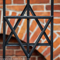 Buy canvas prints of The star of david symbol on the railing at the Stara old Synagogue, Kazimierz, Jewish Quarter, Krakow by SnapT Photography