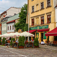 Buy canvas prints of Ariel in Szeroka Street Square in Kazimierz, Jewish Quarter, Krakow, Poland by SnapT Photography