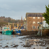 Buy canvas prints of Fishing trawlers moored at Kirkcudbright harbour at lowtide in the winter, by SnapT Photography