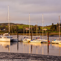 Buy canvas prints of Yachts and boats moored at Kirkcudbright Marina, reflecting on the water by SnapT Photography