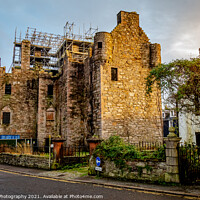 Buy canvas prints of MacLellan's Castle on the old High Street in Kirkcudbright at sunset by SnapT Photography