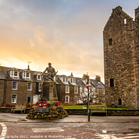 Buy canvas prints of MacLellan's Castle and Kirkcudbright War Memorial on Castle Street by SnapT Photography