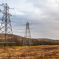 Buy canvas prints of Electricity pylons in a field on a cloudy day in winter at Kendoon Power Station by SnapT Photography
