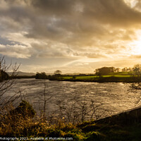 Buy canvas prints of Sun setting over the River Dee at Glenlochar Bridge, on a winter afternoon by SnapT Photography
