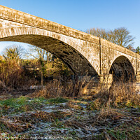 Buy canvas prints of The Ken Bridge on a winters day, with frost on the ground, beside the river by SnapT Photography