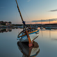 Buy canvas prints of Still waters at sunset by James Catley