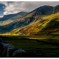 Buy canvas prints of Sun dappled mountains in Snowdonia by Peter Taylor