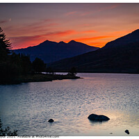 Buy canvas prints of Orange skies over Snowdon by Peter Taylor