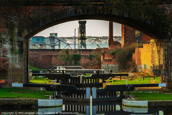 Canal locks into Leeds Liverpool Canal near Liverpool Picture Board by Phil Longfoot