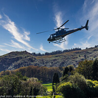 Buy canvas prints of Helicopter flying low at Beddgelert Snowdonia  by Phil Longfoot