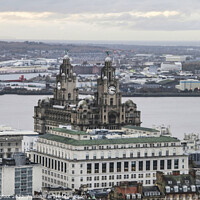 Buy canvas prints of View across the rooftops of Liverpool towards the Royal Liver Building by Phil Longfoot