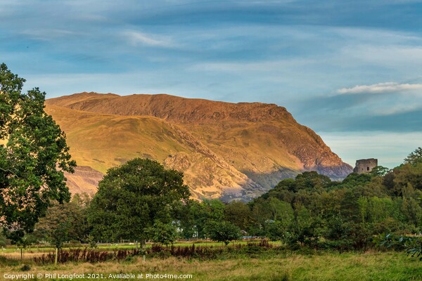 Sunset over the mountains near Llanberis Wales  Picture Board by Phil Longfoot