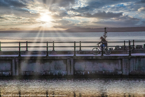 Cycling at Sunset New Brighton Picture Board by Phil Longfoot