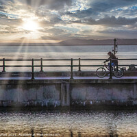 Buy canvas prints of Cycling at Sunset New Brighton by Phil Longfoot