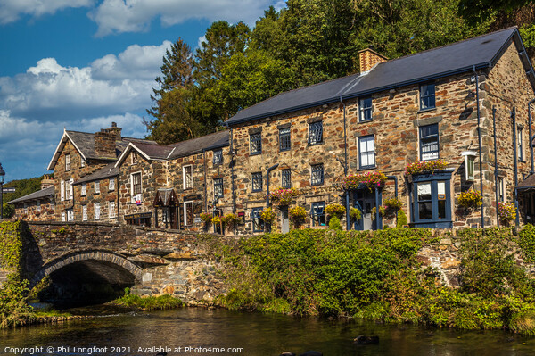 Beddgelert Snowdonia River and Buildings  Picture Board by Phil Longfoot